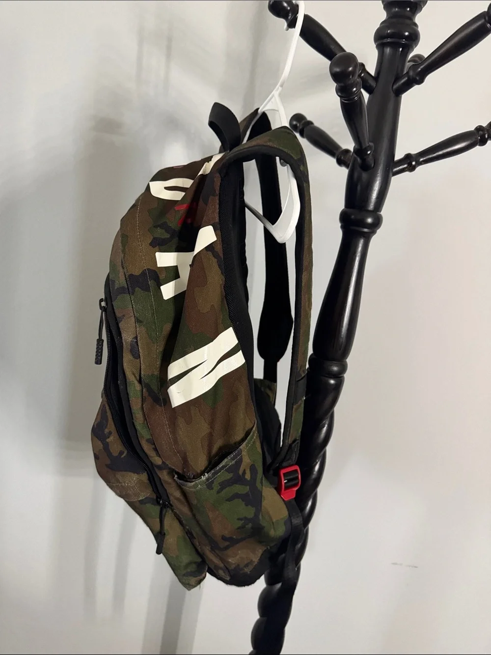 Camouflage Men's Backpack with Red Accent Pulls